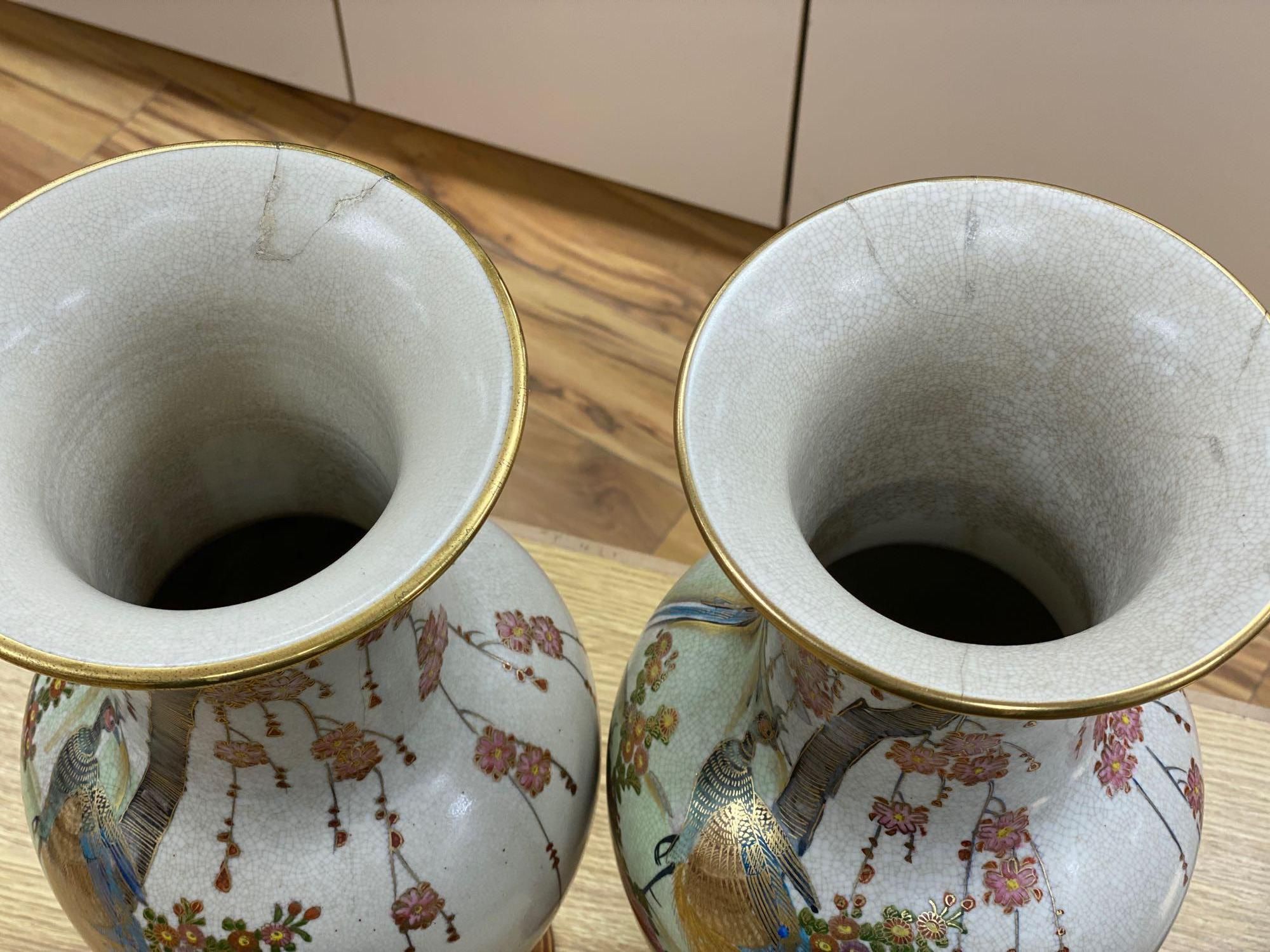 A pair of Japanese satsuma baluster vases, height 46cm, and a satsuma bulbous vase, height 37cm